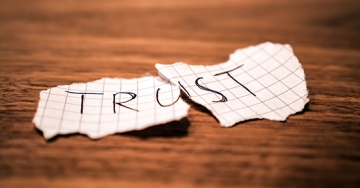paper with trust ripped