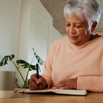 elderly lady writing