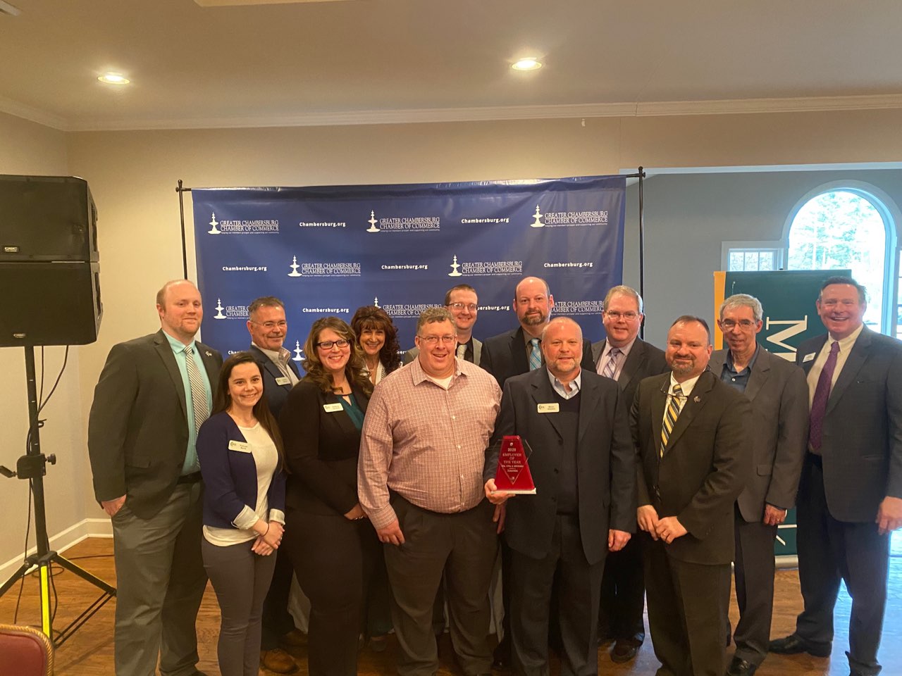 SEK accepts their Employer of the Year Award